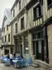 Laval - Pub terrace and houses with wood sides in the old town