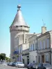 Libourne - Tower of the Grand Harbour and facades of houses in the fortified port 