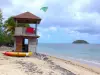 Martinique beaches - Golden sand and position of the beach monitoring cosmy Cove, overlooking the islet of St. Aubin and the Atlantic Ocean; in the municipality of La Trinité