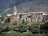 Méailles - Torre de la iglesia y las casas de la aldea