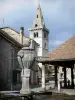 Mens - Fontain, covered market hall and houses of the village (capital of the Trièves), bell tower of the Notre-Dame church overhanging the place