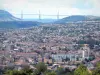 Millau - View of the town skyline and the Millau viaduct, in the Grands Causses Regional Nature Park
