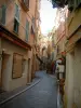 Monaco and Monte Carlo - Narrow paved street of the Monaco rock lined with colourful houses
