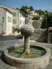 Mons - Fountain and houses of the village