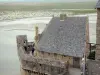 Mont-Saint-Michel - House and ramparts of the medieval town (village) with view of the Mont-Saint-Michel bay