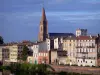 Montauban - Bell tower of the Saint-Orens church and facades of houses along River Tarn 