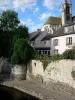 Moret-sur-Loing - Bank of the River Loing, houses of the medieval town and belfry of the Notre-Dame church dominating the set