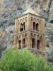 Moustiers-Sainte-Marie - Bell tower of the Notre-Dame-de-l'Assomption church, tree and cliff