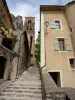 Moustiers-Sainte-Marie - Stair, bell tower of the Notre-Dame-de-l'Assomption church and houses of the village