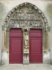 Mouzon - Portal central de la iglesia de la abadía de Notre-Dame y el tímpano esculpido