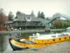 Nantes - Barge moored to a quay, the River Erdre and the harbour office (Versailles island)