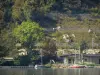 Nantua lake - Moored sailboats and bank of the lake; in Upper Bugey 