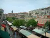 Nice - View of the flower market of Saleya courts and its colourful houses in the old town