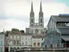 Niort - Steeples of the Saint-André church, covered market hall of Baltard style and facades of the old town