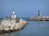 Palavas-ле-Фло - Морской курорт: волнорез (скалы), портовый огонь, скульптура и Средиземное море