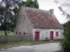 Parque Natural Regional de Brenne - Casa de piedra, por carretera y los árboles