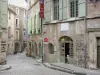 Pézenas - Old town: Barber Gely house home to the tourist office, paved street lined with houses