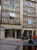 Poitiers - Facades of timber-framed houses, shops and café terrace