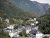 Pyrenees landscapes - Gavarnie valley: houses of the of village Gèdre surrounded by trees and mountains