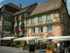 Ribeauvillé - Square with cafe terraces and houses with colourful facades