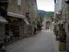 Rocamadour - Street of the village with stone houses, shops and Hugon gateway, in the Regional Nature Park of the Quercy Limestone Plateaus