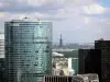 Roof of the Grande Arche in La Défense - View of buildings in the La Défense district and Paris from the roof of the Grande Arche