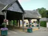 Saint-Denis-d'Anjou - Flower-bedecked covered market halls