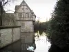 Saint-Germain-de-Livet castle - Timber-framed manor house, moats with a swan, and trees, in the Pays d'Auge area
