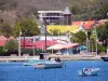 Les Saintes - View of the Notre-Dame-de-l'Assomption church and Terre-de-Haut houses at the seaside