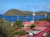 Les Saintes - View of the red roofs of Terre-de-Haut and boats on the sea