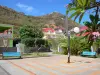 Les Saintes - Square with benches and houses of Terre-de-Haut