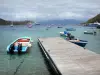 Les Saintes - Jetty overlooking the sea dotted with boats