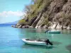 Les Saintes - Boats floating on the clear waters of Petite Anse du Pain de Sucre