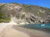 Les Saintes - Beach of the Rodrigue cove and boat floating on the turquoise sea