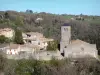 Saissac - Laymone tower or bell tower of the Saint-Michel church and houses of the village