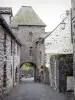 Salers - Gate of the Martille and stone houses of the medieval city
