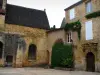 Sarlat-la-Canéda - Chanoines court with the Pénitents Bleus chapel and a stone residence, in Périgord