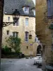 Sarlat-la-Canéda - Lampposts and houses of the medieval old town, in Périgord