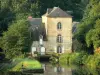 Thévalles castle and mill - Erve valley: Thévalles water mill surrounded by greenery and River Erve; in the town of Chémeré-le-Roi