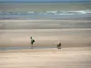 Touquet-Paris-Plage - Opal Coast: sandy beach with two walkers and the Channel (sea)