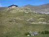 Troumouse cirque - Stone house, lawn and mountain in the Pyrenees National Park