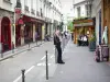 Urban landscape - Facades and restaurants of the Sauval street in the district of Les Halles