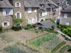 Uzerche - Garden and facades of houses of the medieval garden