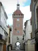 Villeneuve-sur-Lot - Porte de Paris (remains of old walls) and facades of houses in the bastide (old town)