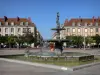 Vitry-le-François - Armes square: fountain with the statue of the River Marne called Déesse, trees and buildings of the city