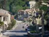 Vogüé - Street lined with plane trees and stone houses