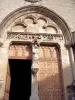 Tympan du portail de l'église abbatiale (© Jean Espirat)